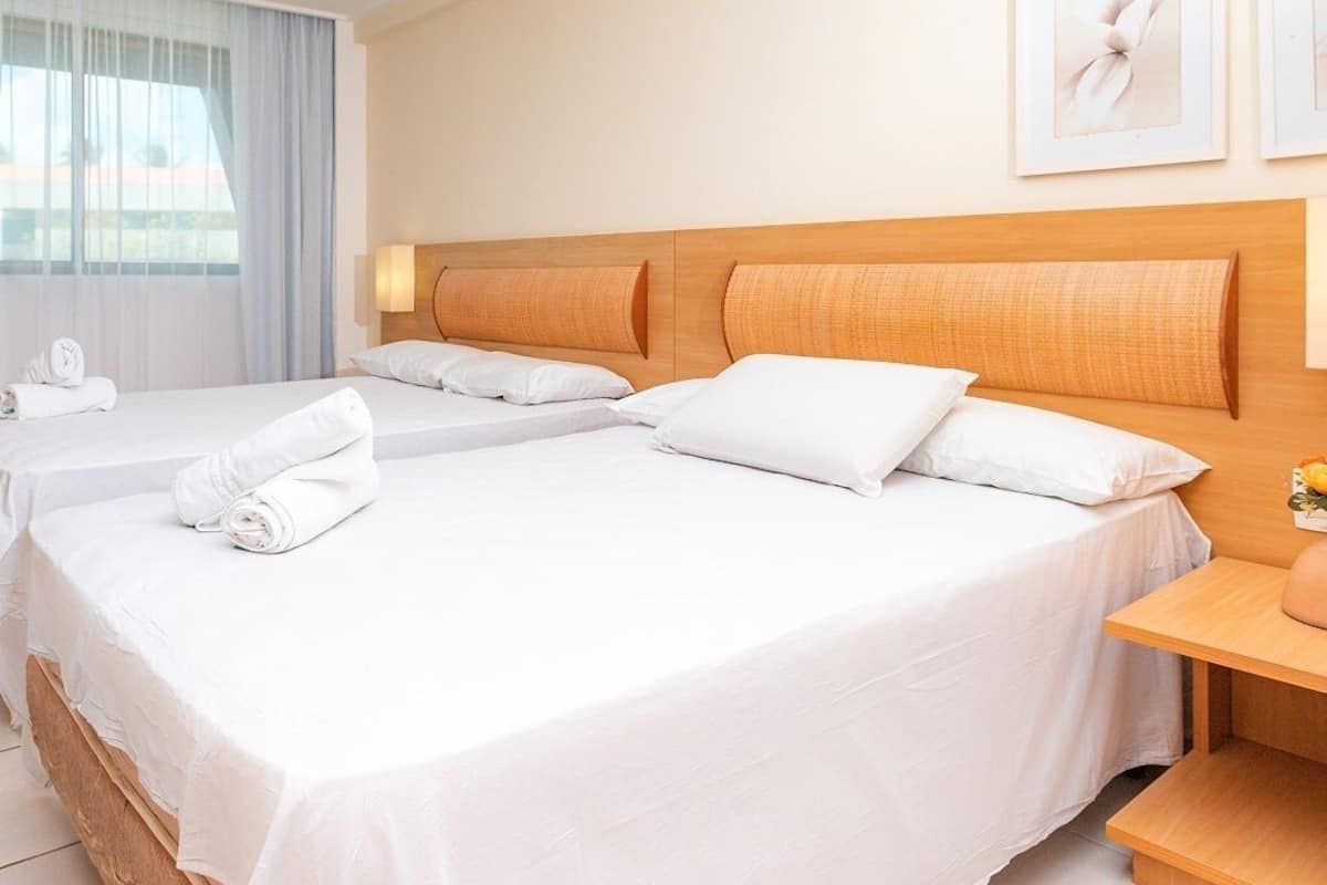 Departamento estándar, varias camas | 1 habitación, escritorio, wifi gratis y ropa de cama