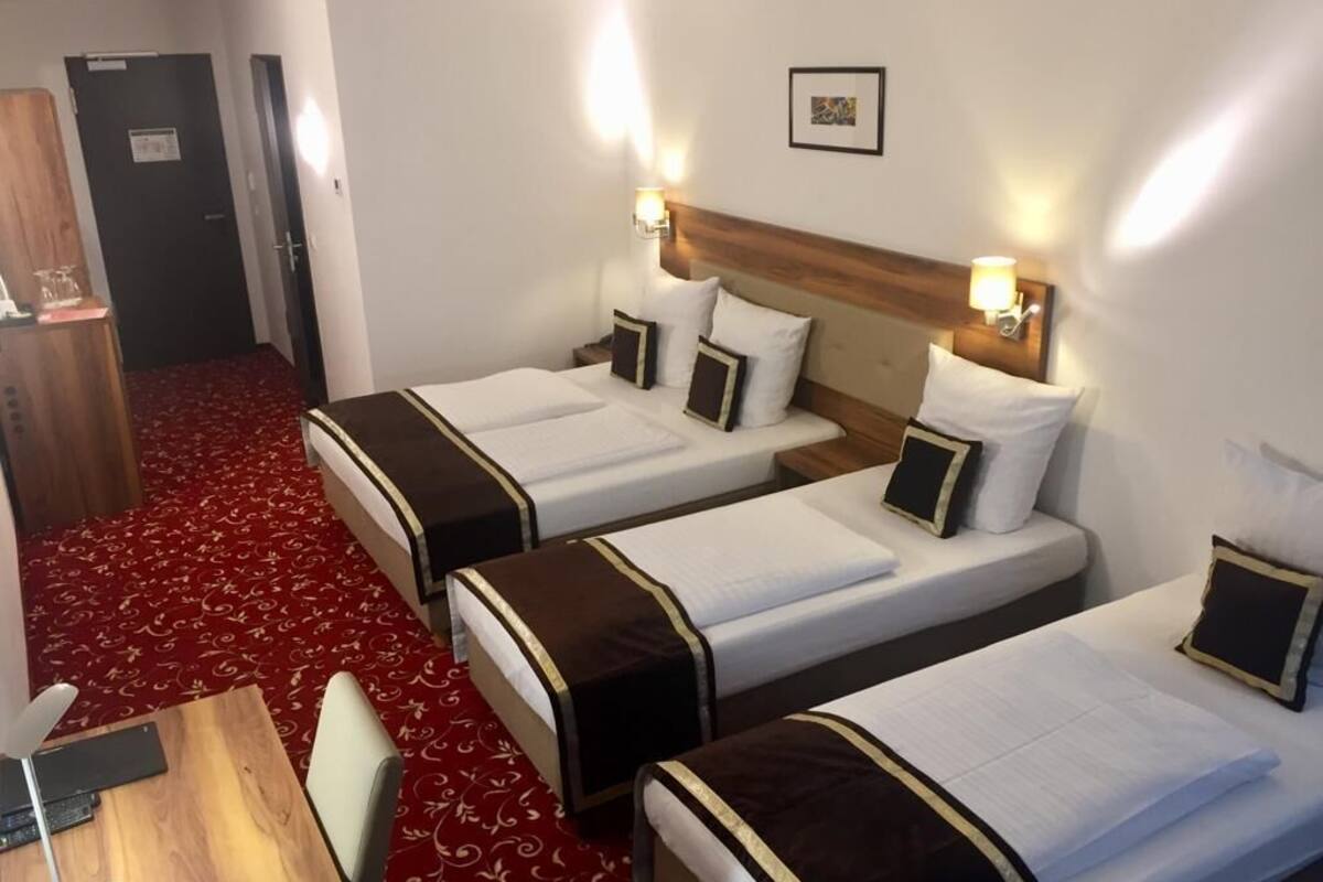 standard quadruple room | premium bedding, minibar, in-room safe, desk