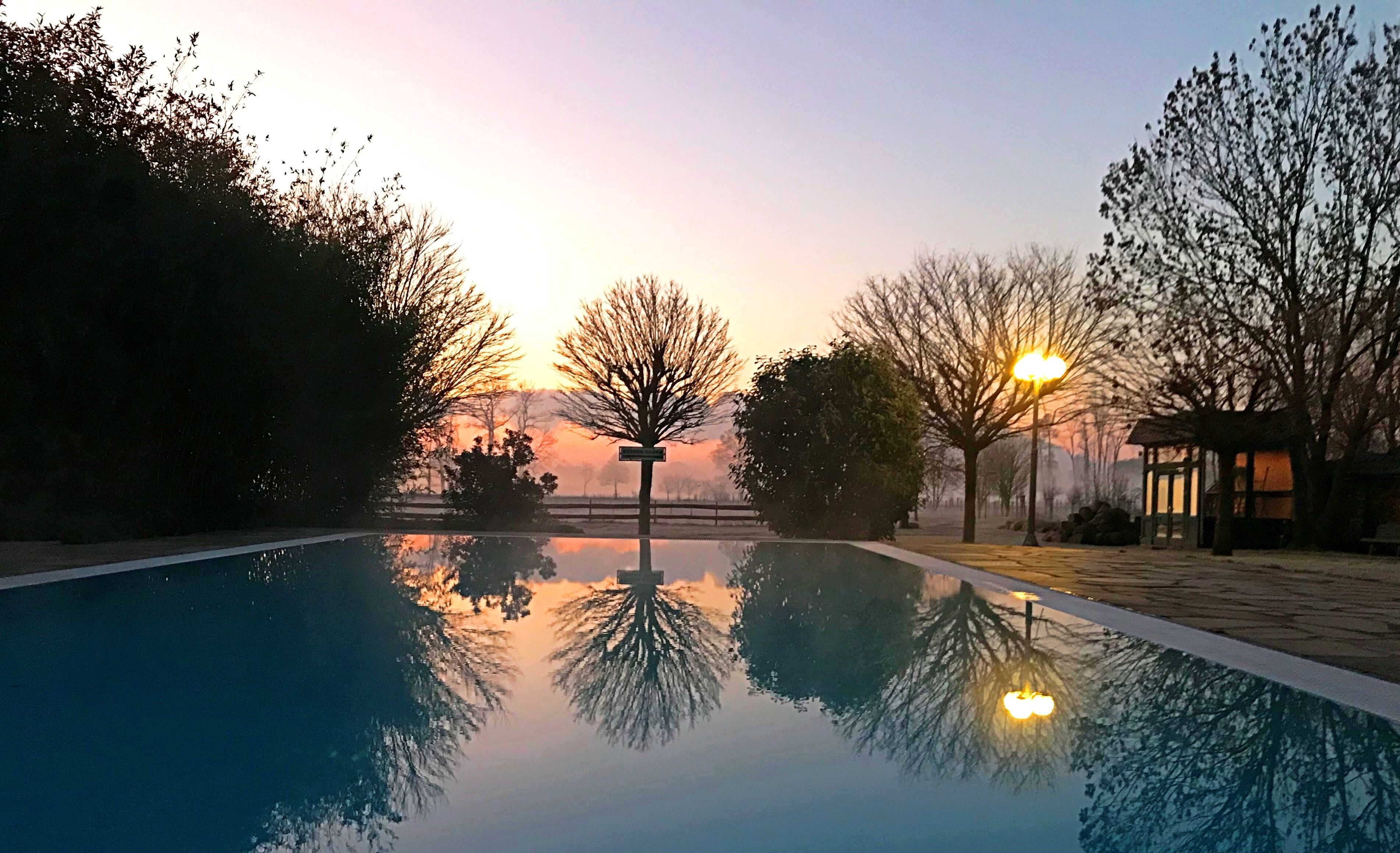 indoor pool, outdoor pool, pool umbrellas, pool loungers