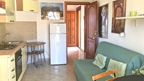 Apartment, 1 Schlafzimmer | Wohnbereich | Fernseher