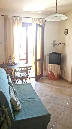 Apartment, 1 Bedroom | Living area | TV - Camelie Apartment II (Budoni)