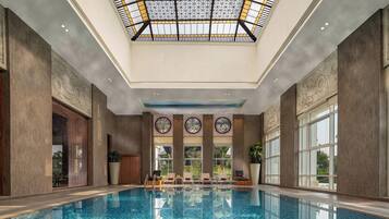 Indoor pool, 3 outdoor pools, open 9:00 AM to 5:00 PM, pool umbrellas