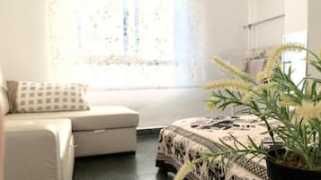 Habitació quàdruple, bany compartit | Wifi gratuïta i roba de llit