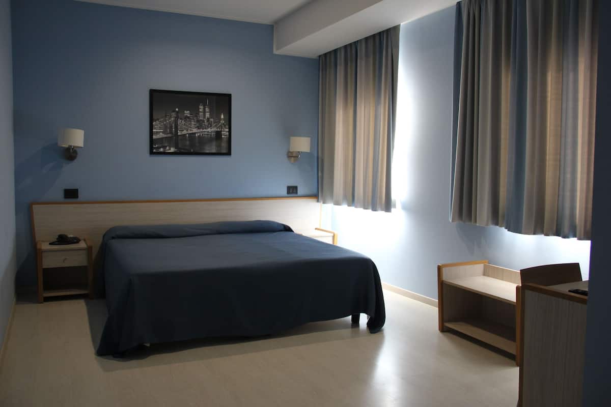 Ropa de cama de alta calidad y minibar