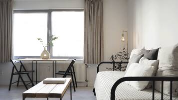 Comfort Studio (A202) | Premium bedding, down duvets, blackout curtains, free WiFi