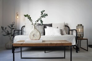 Comfort Studio (A202) | Premium bedding, down comforters, blackout drapes, free WiFi