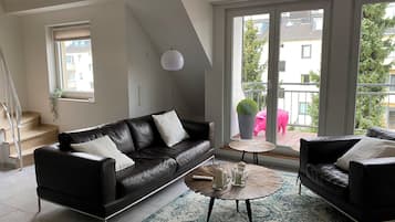 Loft 25 | 起居區 | 30-公分平面電視,提供衛星頻道