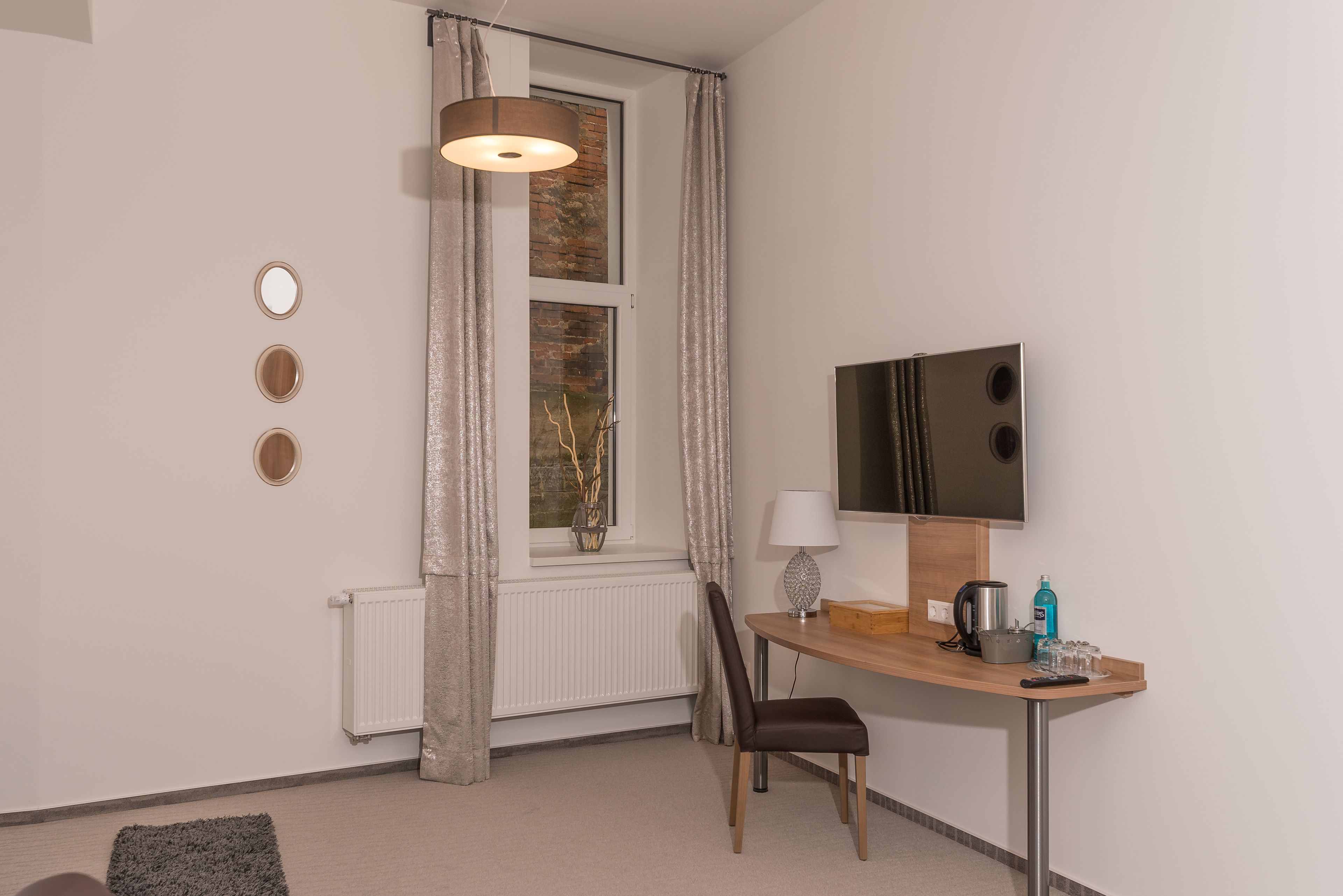 desk, blackout curtains, soundproofing, iron/ironing board