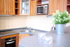 Family Apartment, City View | Private kitchen | Fridge, microwave, oven, stovetop - Vodickova apartment (Prague)