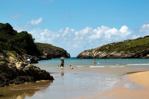 A la platja, platja de sorra blanca i pesca 