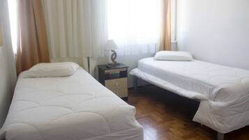 Frigobar, cortinas blackout, Wi-Fi de cortesia, roupa de cama