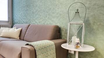 Apartment, 2 Bedrooms | Living room | Flat-screen TV