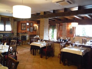 Breakfast, lunch, dinner served; local cuisine, pool views