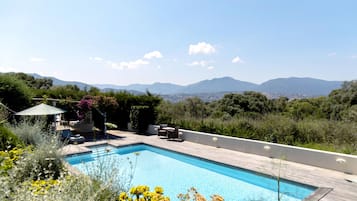 Seasonal outdoor pool, pool umbrellas, sun loungers