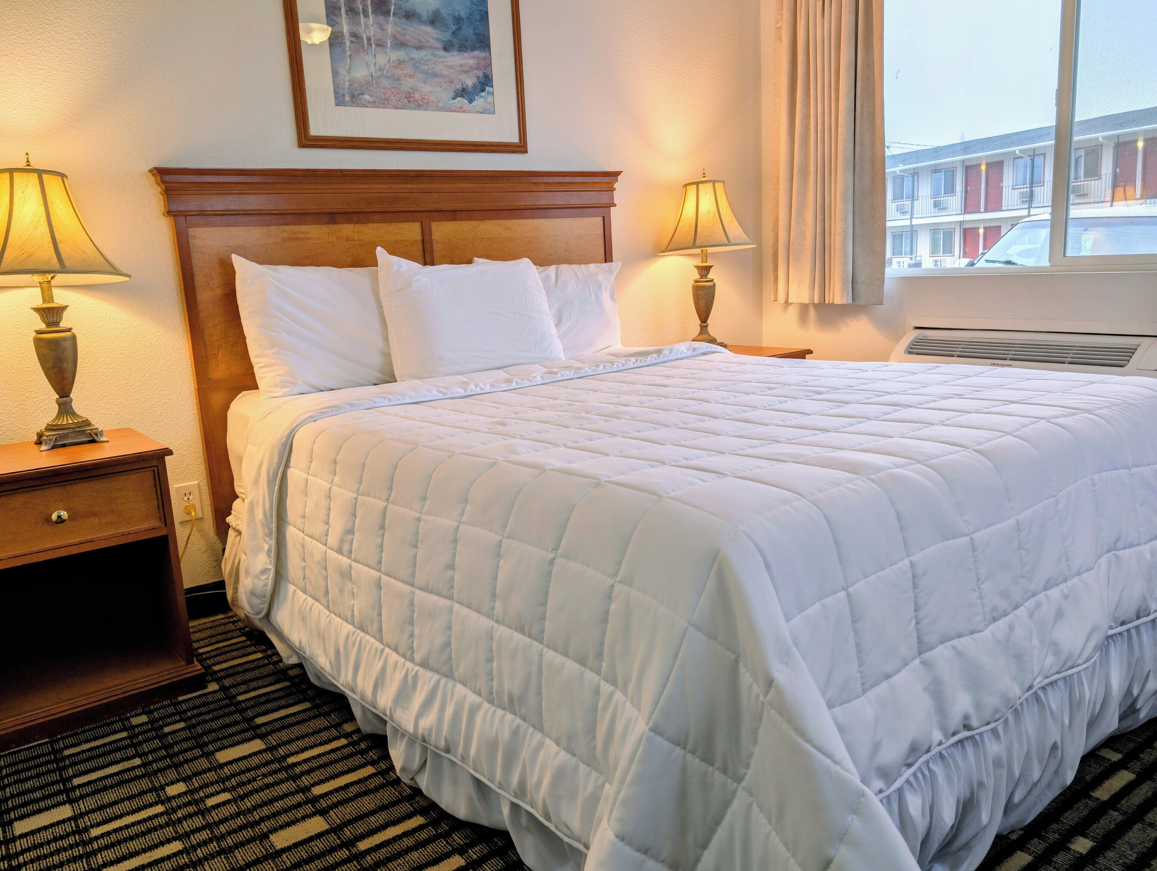 Room, 1 Queen Bed (Pet Friendly) | Blackout drapes, iron/ironing board, free WiFi, bed sheets