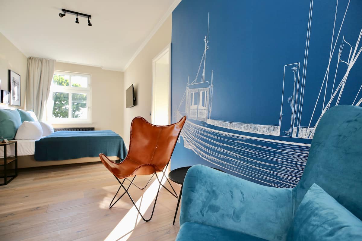 standard double room, partial sea view | premium bedding, in-room safe, individually decorated