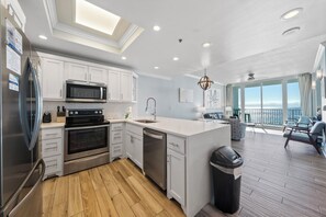Exclusive Condo, 3 Bedrooms, Balcony, Ocean View | Private kitchen | Full-sized fridge, microwave, oven, stovetop - Lighthouse Condos by Hosteeva (Gulf Shores)