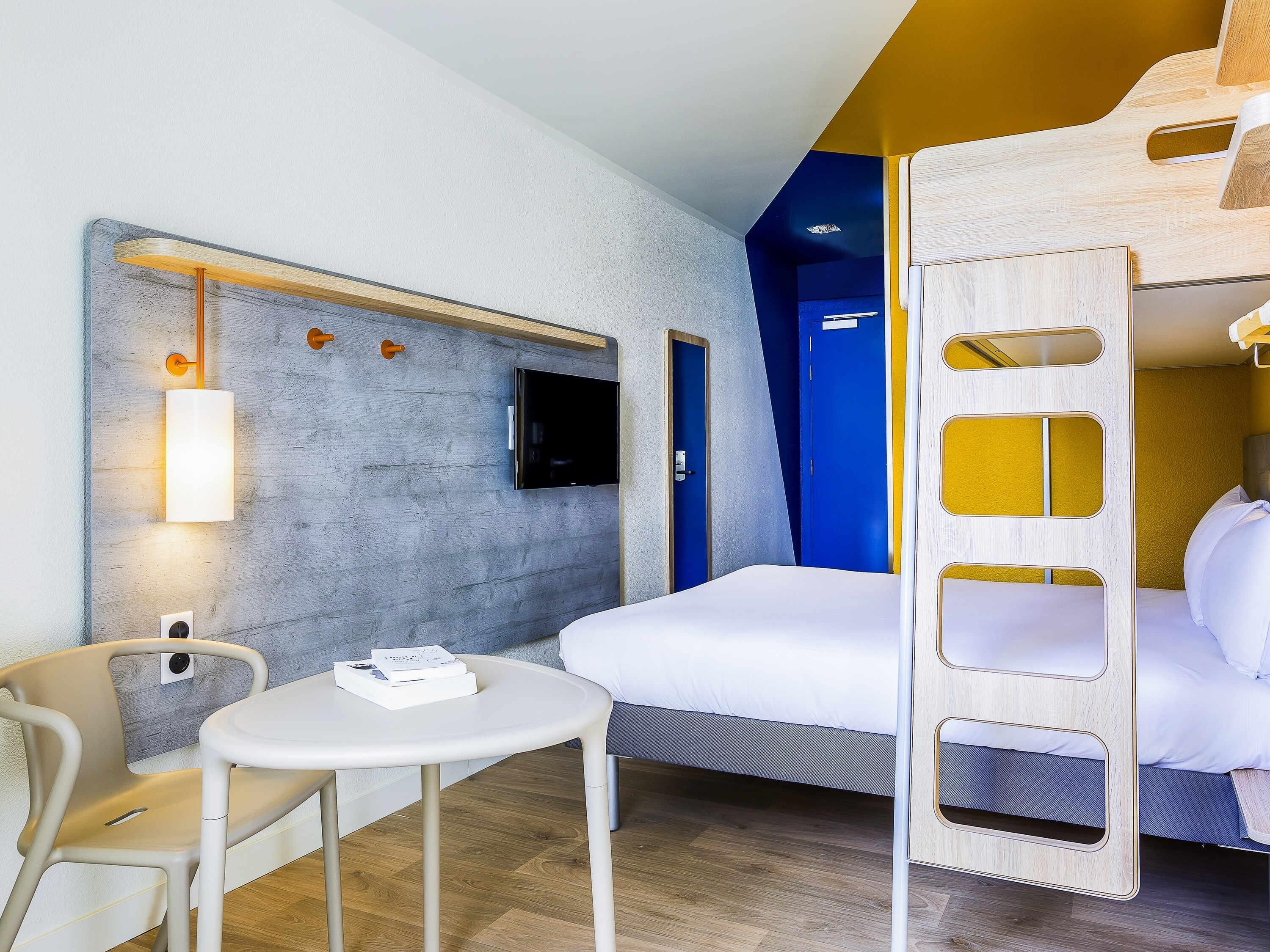 Premium bedding, desk, blackout drapes, soundproofing
