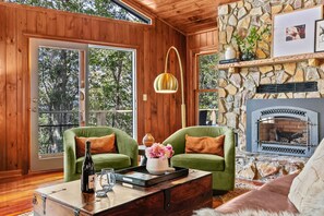 Flat-screen TV, fireplace, DVD player, ping pong