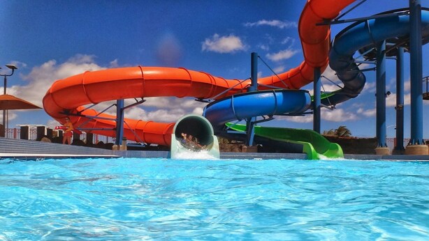 A water park with multiple slides and a pool. - House with private pool, not shared between Vaison la Romaine and Nyons (Saint-Maurice-sur-Eygues.)