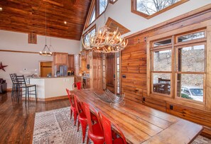 Enjoy cooking in this well-equipped kitchen with a large island and comfortable seating area.