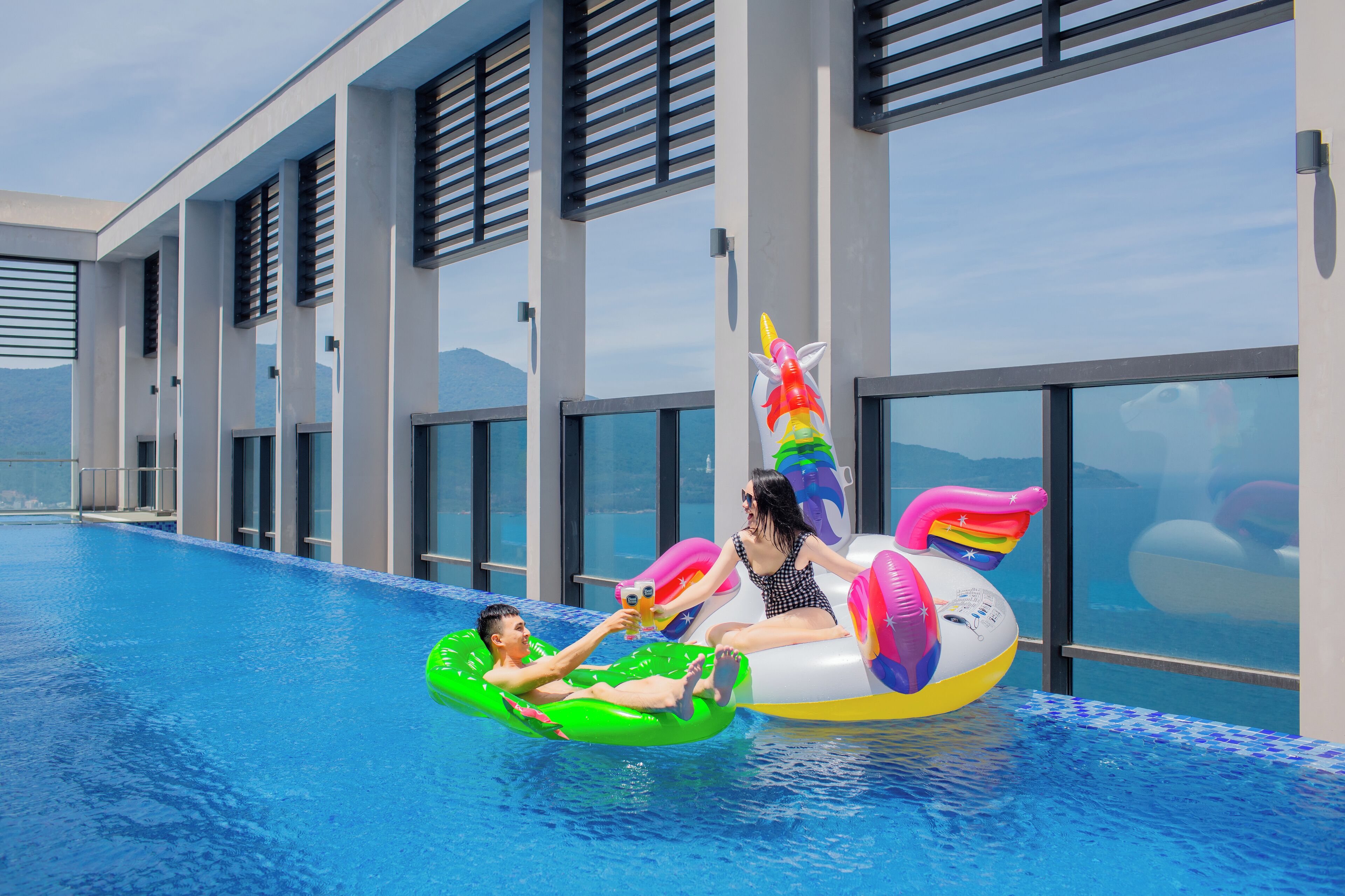 Outdoor pool, open 6:00 AM to 9:00 PM, pool umbrellas, sun loungers