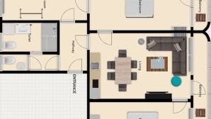 A floor plan of a hotel with two bedrooms, a living room, a balcony, a bathroom, and a dining area.