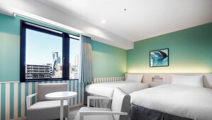A hotel room with two beds, a small table, a chair, and a large window with a city view. - DEL style NAGOYA-NAYABASHI by Daiwa Roynet Hotel (Nagoya)
