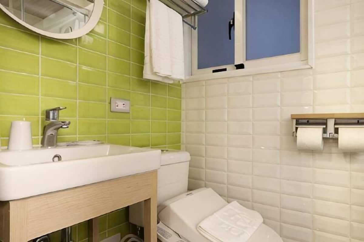 Bathroom | Shower, free toiletries, hair dryer, slippers