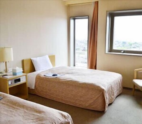 Twin Room | Desk, iron/ironing board, free WiFi