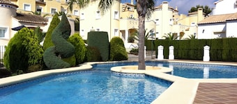 Detached villa with garden and communal pool