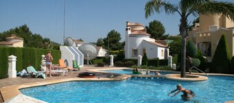 Detached villa with garden and communal pool