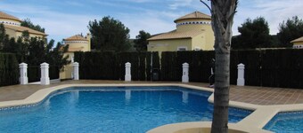 Detached villa with garden and communal pool