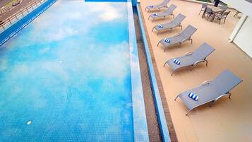 Outdoor pool, sun loungers