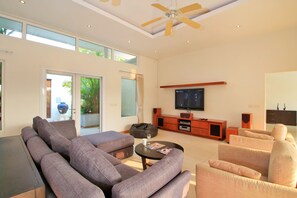 4-Bedroom Villa | Living room | 60-inch flat-screen TV with cable channels, TV - Pattaya Sunset Villa 4 Bedroom Sleeps 8 (Pattaya)