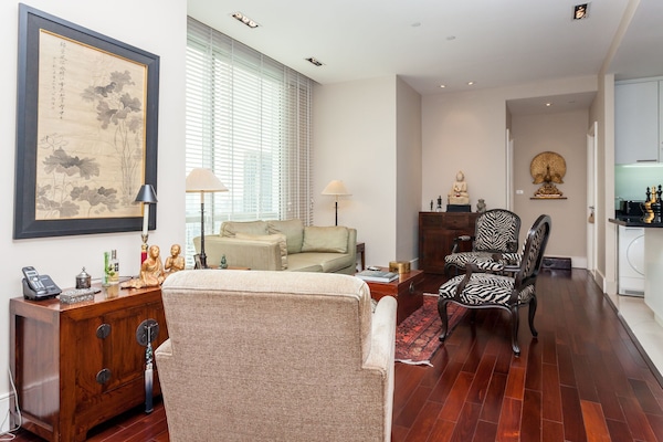 Cosy LIVING ROOM with separate open-plan kitchen