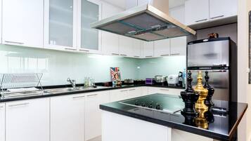 Fridge, microwave, stovetop, coffee/tea maker