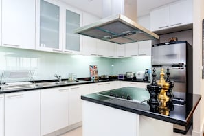 Fridge, microwave, stovetop, coffee/tea maker