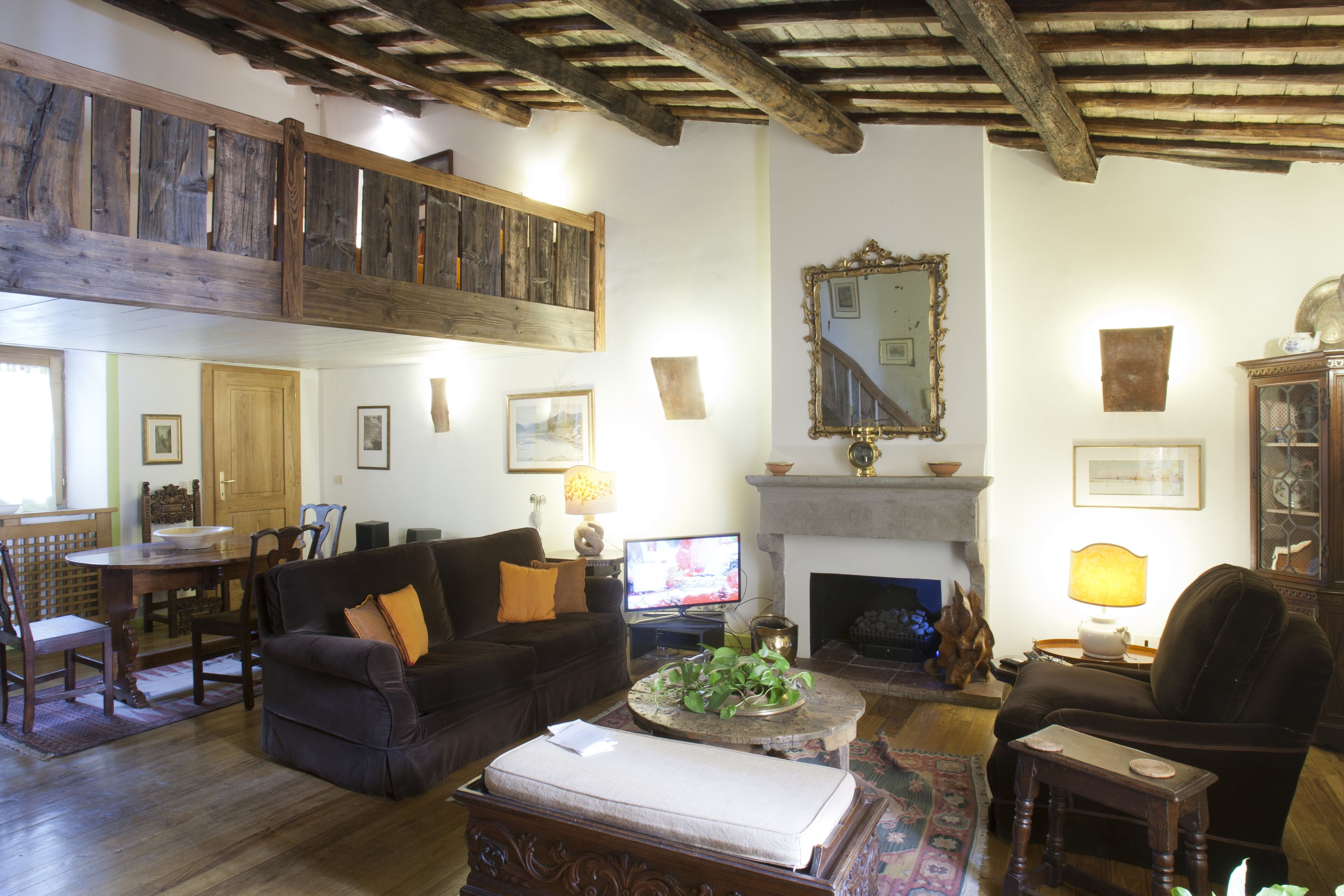 TV, fireplace, books, stereo