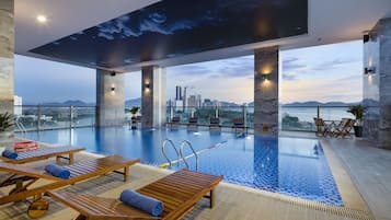 Indoor pool, open 6 AM to 8 PM, pool loungers