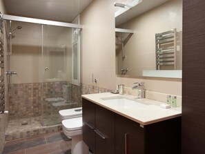 Bathtub, hair dryer, towels