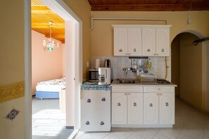 Fridge, microwave, coffee/tea maker, toaster