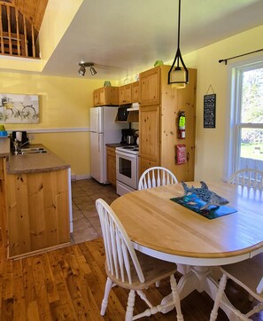 Fridge, microwave, oven, stovetop - Little Eden Summer Beach Home (Canoe Cove)