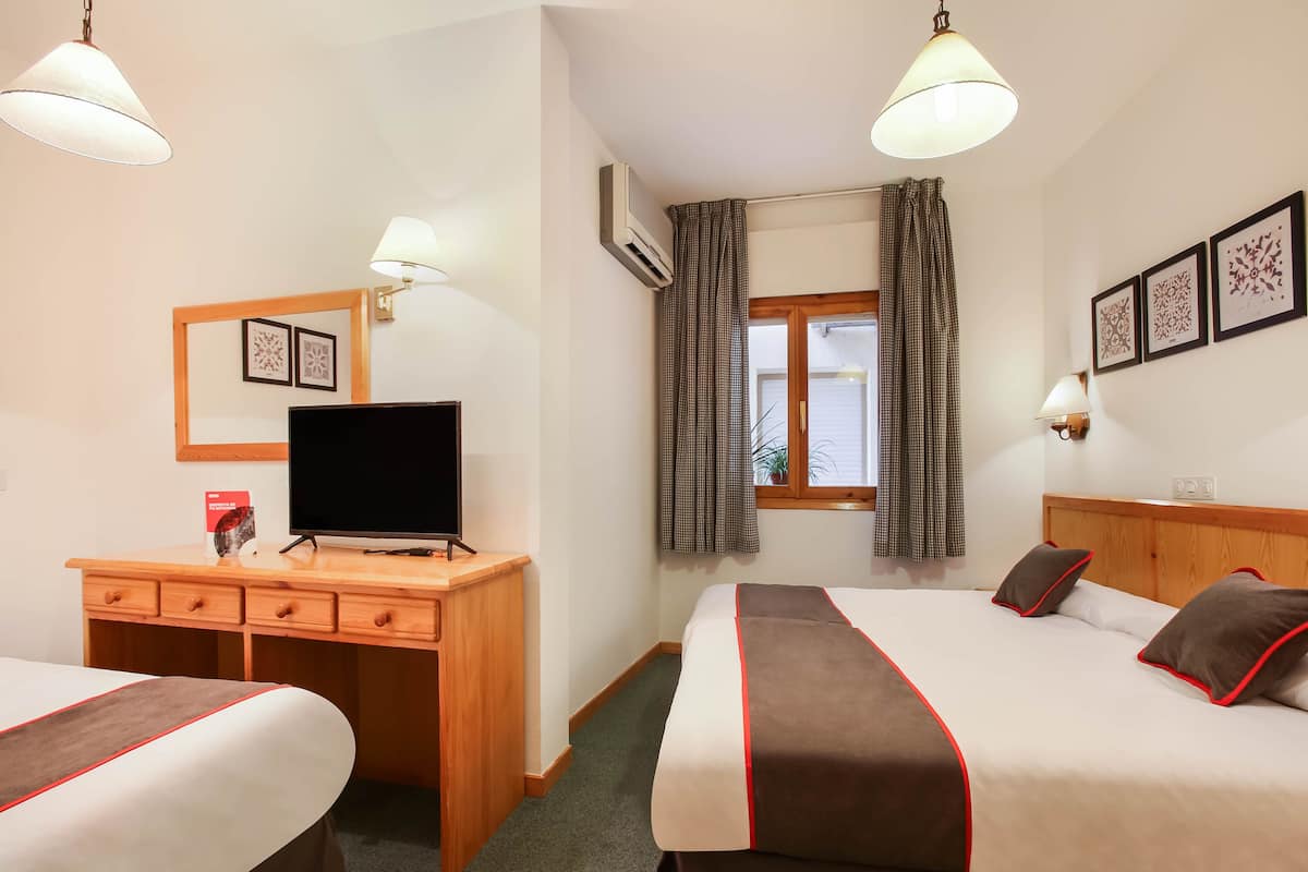 Desk, iron/ironing board (on request), WiFi (free), bed sheets