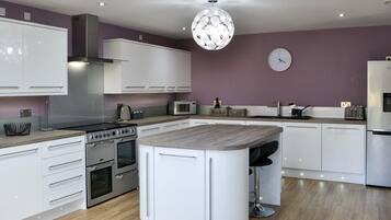 Microwave, dishwasher, highchair, cookware/dishes/utensils