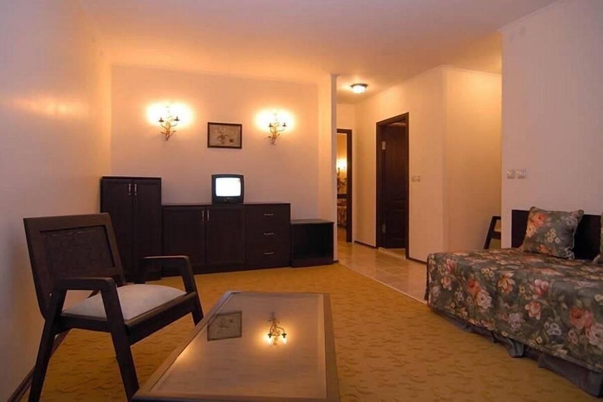 Family Suite, 1 Bedroom | Living area | LCD TV