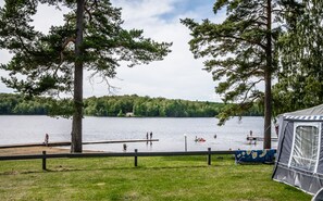 On the beach, rowing