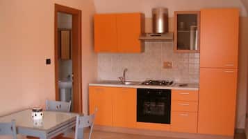 Departamento | Cocina privada | Refrigerador, microondas, parrilla de estufa y cafetera de espresso