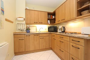 Fridge, microwave, coffee/tea maker, electric kettle