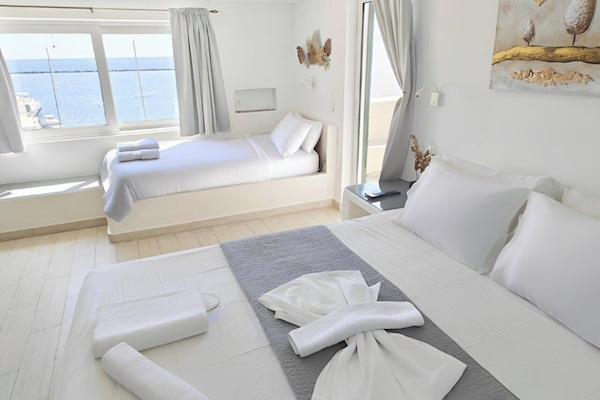 Quadruple Room, Sea View | In-room safe, iron/ironing board (on request), WiFi (free), bed sheets